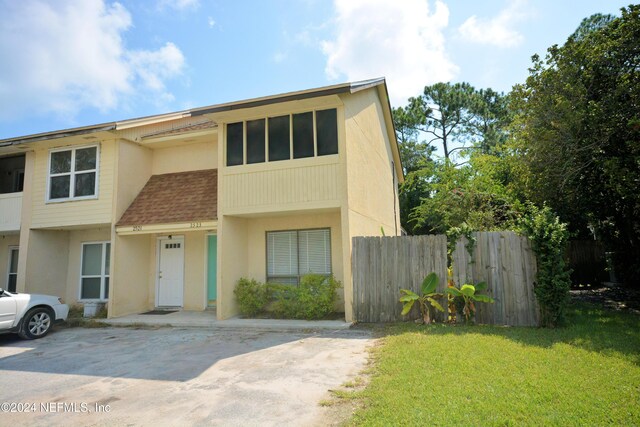 view of property with a front yard