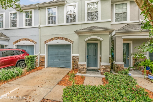 view of property with a garage