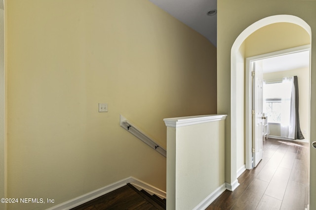 stairway featuring hardwood / wood-style flooring