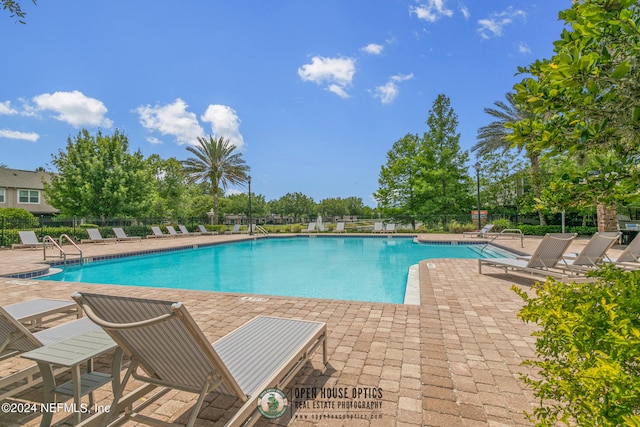 view of pool with a patio