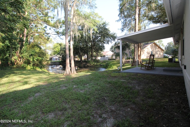 view of yard with a patio area