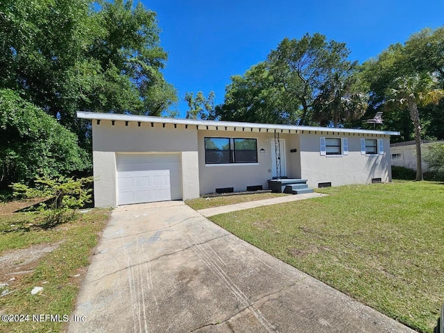 single story home with a garage, concrete driveway, crawl space, stucco siding, and a front yard