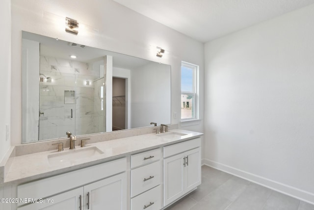 bathroom with walk in shower and vanity