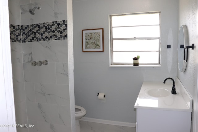 3037 Ribault Scenic Dr, Jacksonville, FL 32208 - full bath featuring vanity, toilet, baseboards, marble finish floor, and tiled shower