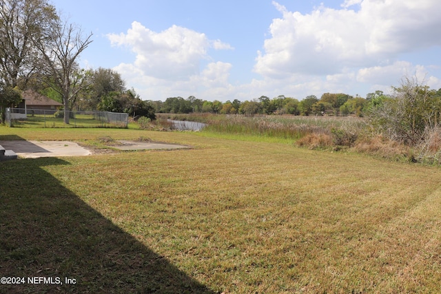 3037 Ribault Scenic Dr, Jacksonville, FL 32208 - view of yard featuring a water view and fence