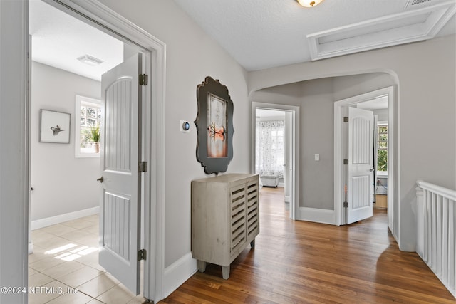 hallway with wood-type flooring