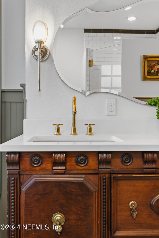 interior details with dual bowl vanity and tasteful backsplash