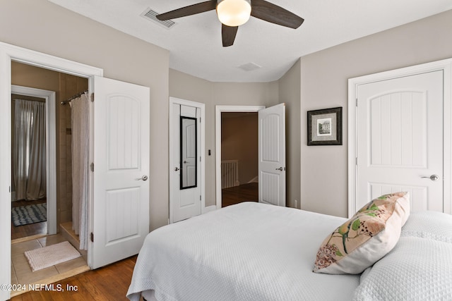 bedroom with ceiling fan and hardwood / wood-style flooring