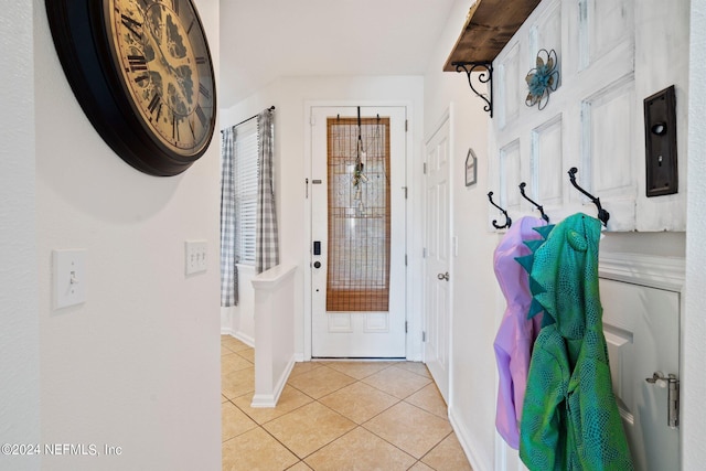 mudroom featuring light tile patterned floors