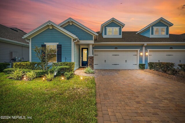 view of front of house with a garage