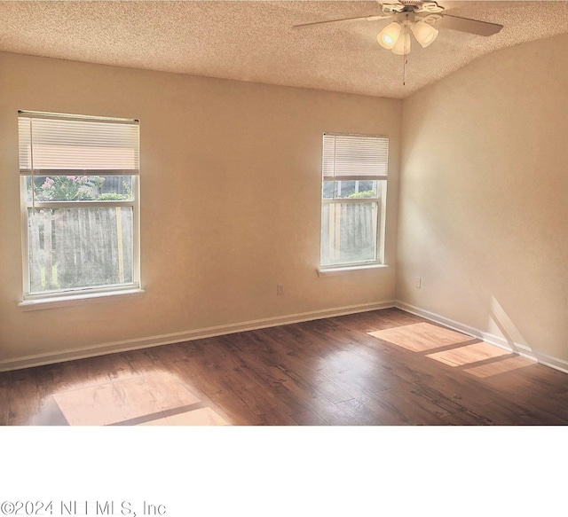 unfurnished room with a textured ceiling, ceiling fan, and wood-type flooring