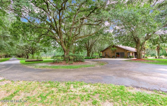 view of front of property with fence