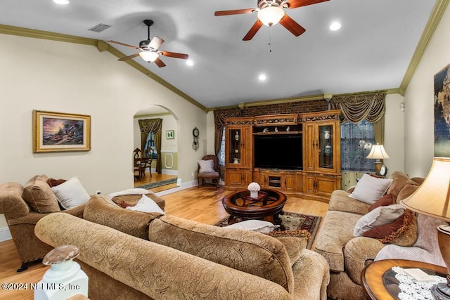 living room featuring ornamental molding, lofted ceiling, light hardwood / wood-style flooring, and ceiling fan