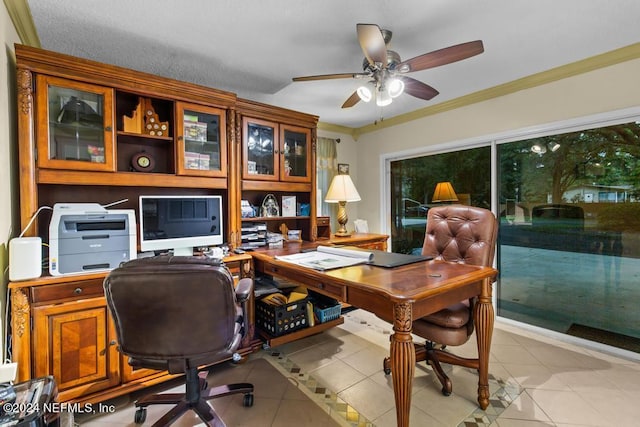 office area with ceiling fan, ornamental molding, and light tile patterned floors