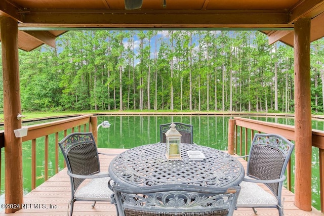 wooden deck with outdoor dining area