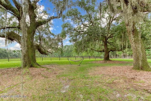 view of yard featuring fence