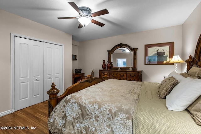 bedroom with wood-type flooring, ceiling fan, and a closet