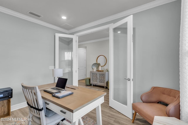 office area featuring crown molding, light hardwood / wood-style floors, and french doors