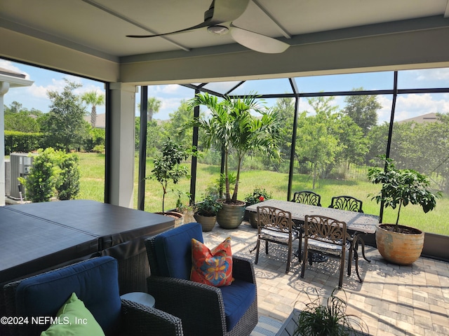 sunroom / solarium with ceiling fan