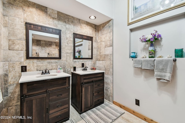 bathroom featuring vanity and wood-type flooring