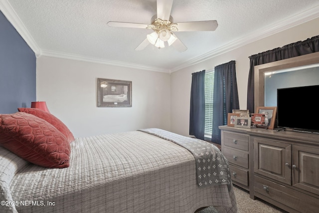 bedroom featuring a textured ceiling, light colored carpet, ceiling fan, and ornamental molding