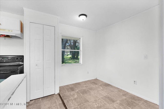 kitchen featuring light tile patterned floors, custom exhaust hood, and stove