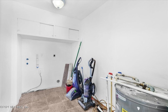 157 W Grandview Dr, East Palatka, FL 32131 - washroom with laundry area, electric dryer hookup, and electric water heater
