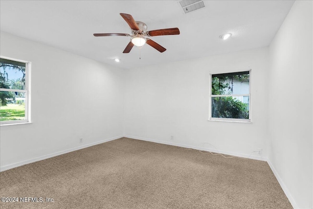 157 W Grandview Dr, East Palatka, FL 32131 - spare room featuring ceiling fan, carpet, recessed lighting, baseboards, and visible vents