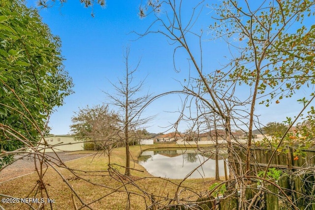 view of water feature featuring fence