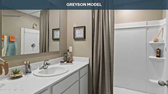 5944 Ortega Lake Dr, Jacksonville, FL 32244 - bathroom with vanity and a shower with curtain