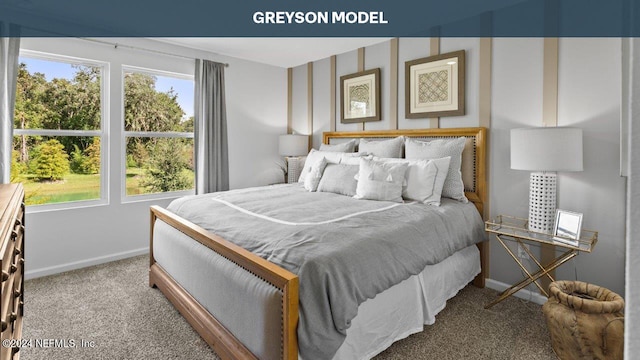 5944 Ortega Lake Dr, Jacksonville, FL 32244 - carpeted bedroom featuring baseboards