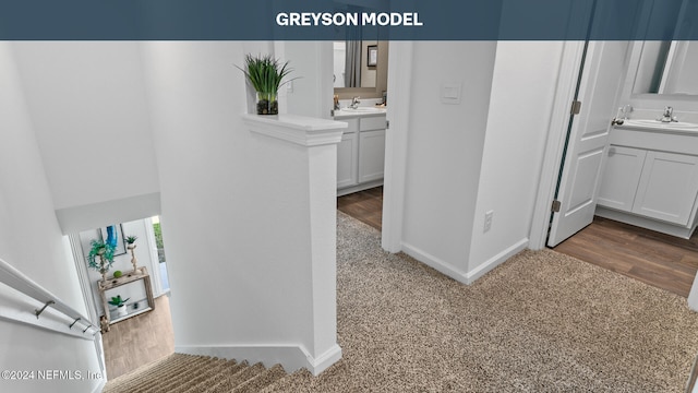 5944 Ortega Lake Dr, Jacksonville, FL 32244 - hall featuring carpet floors, baseboards, and a sink