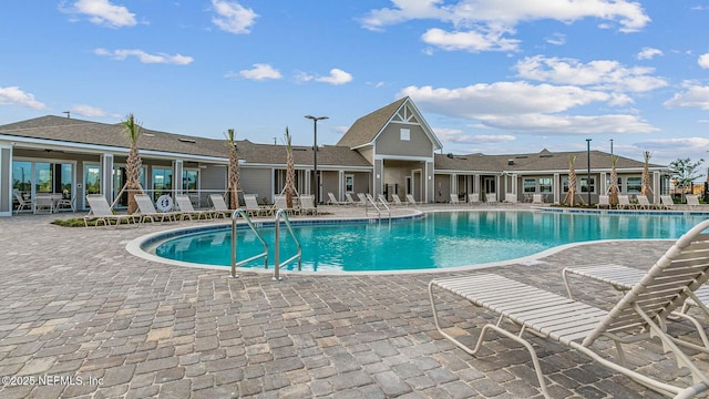 view of swimming pool featuring a patio