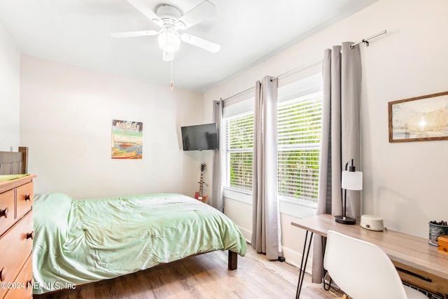 bedroom featuring ceiling fan and light wood-type flooring