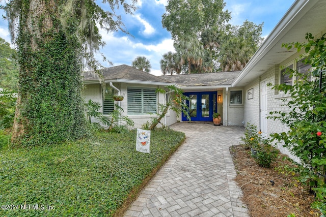 view of exterior entry with french doors