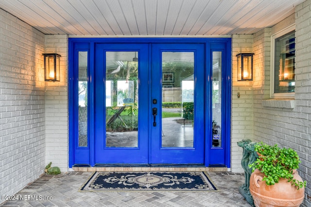 entrance to property featuring french doors