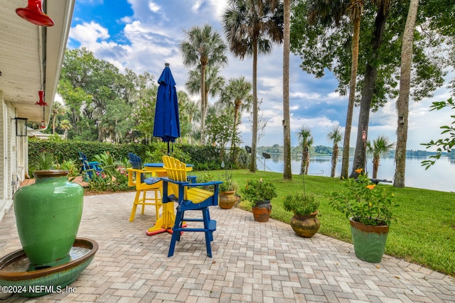 view of patio / terrace with a water view