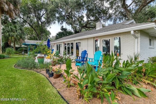 exterior space featuring a patio and a yard