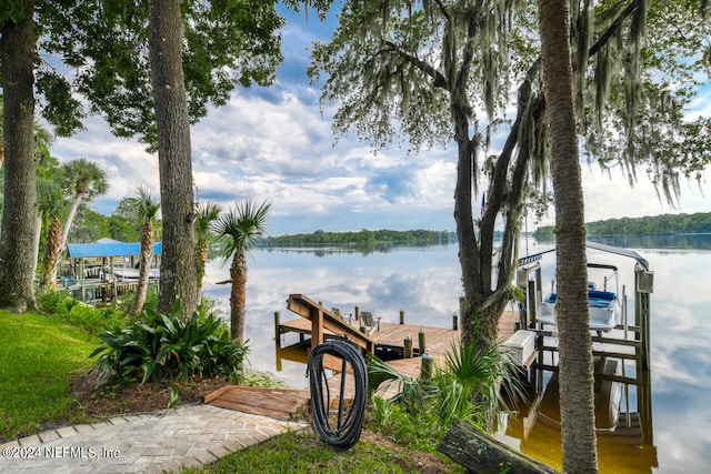 dock area featuring a water view