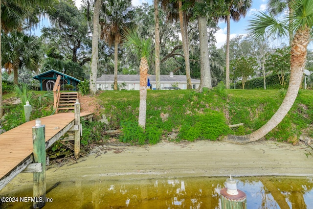 view of property's community with a water view