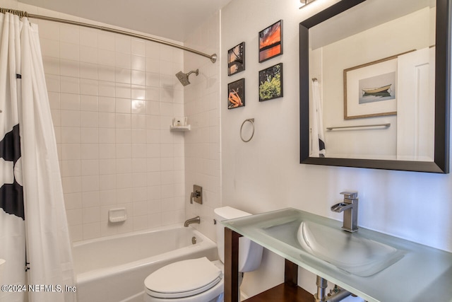 bathroom with shower / bathtub combination with curtain and toilet