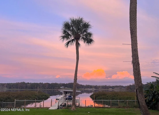 property view of water featuring a boat dock