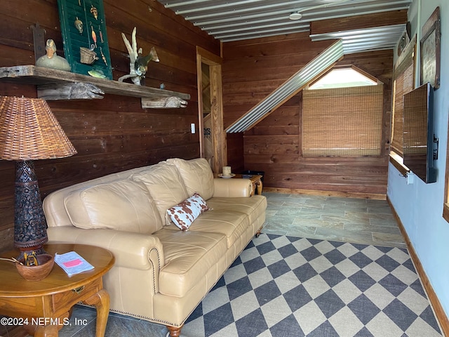 living room with wood walls