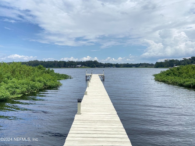 view of dock with a water view