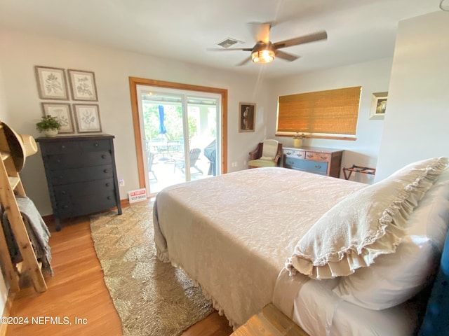 bedroom with ceiling fan, access to outside, and light hardwood / wood-style flooring