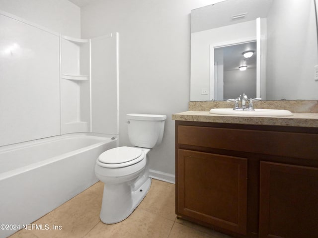 full bathroom with tile patterned flooring, toilet, visible vents, vanity, and washtub / shower combination