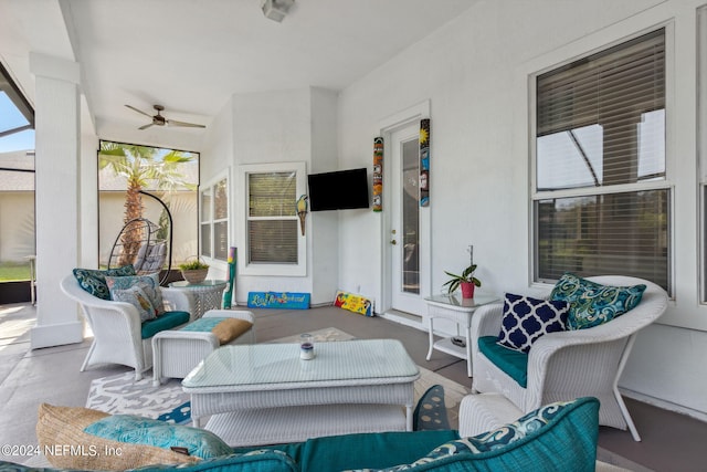 view of patio featuring an outdoor hangout area and a ceiling fan