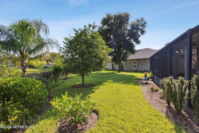 view of yard featuring fence