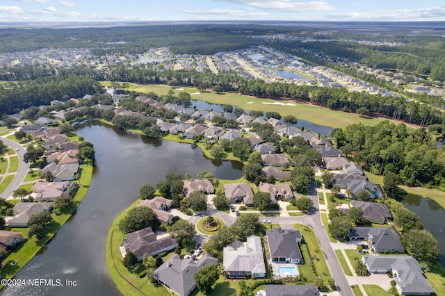 bird's eye view with a water view and a residential view