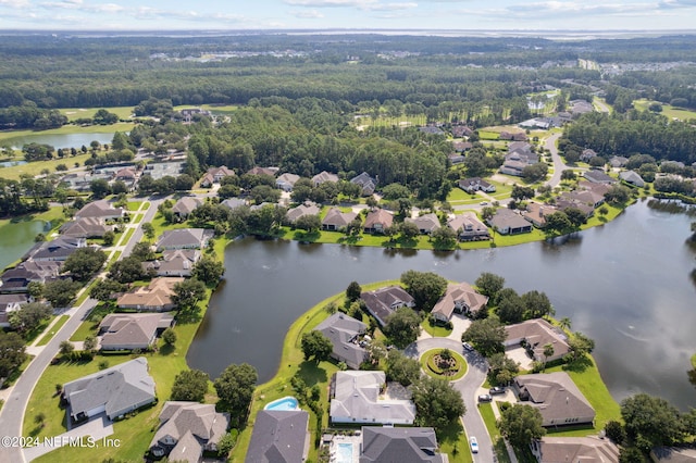 aerial view with a water view and a residential view